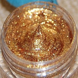 Glitter Makeup - Use this gold glitter makeup to add sparkles to your body and face. Perfect way to get ready for festivals and parties. Makeup gift for women for great party night